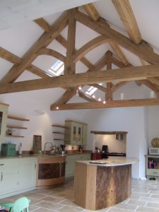 green oak timber frame king post feature trusses and purlins