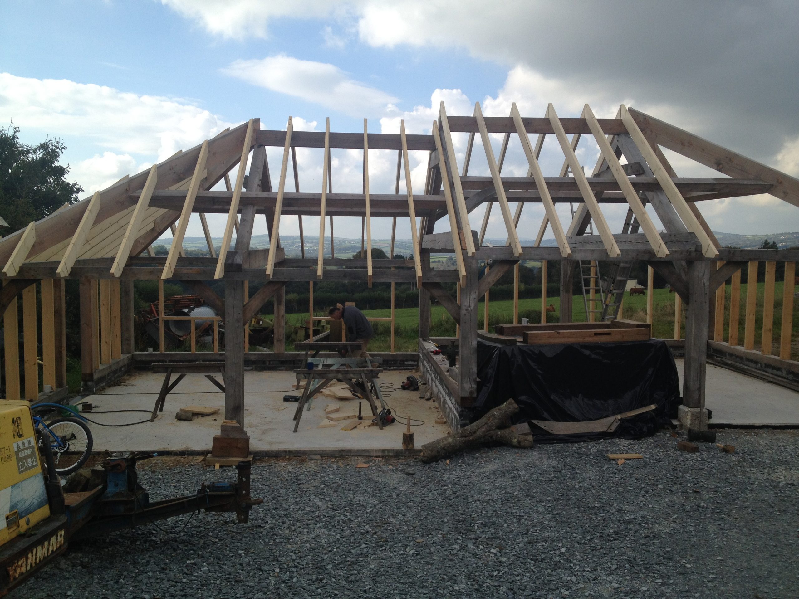 a traditional style structural heavy timber frame being constructed in the Tamar Valley in Devon