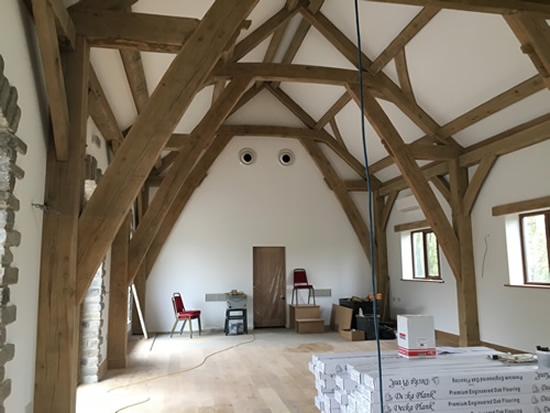 green oak timber frame with a vaulted roof