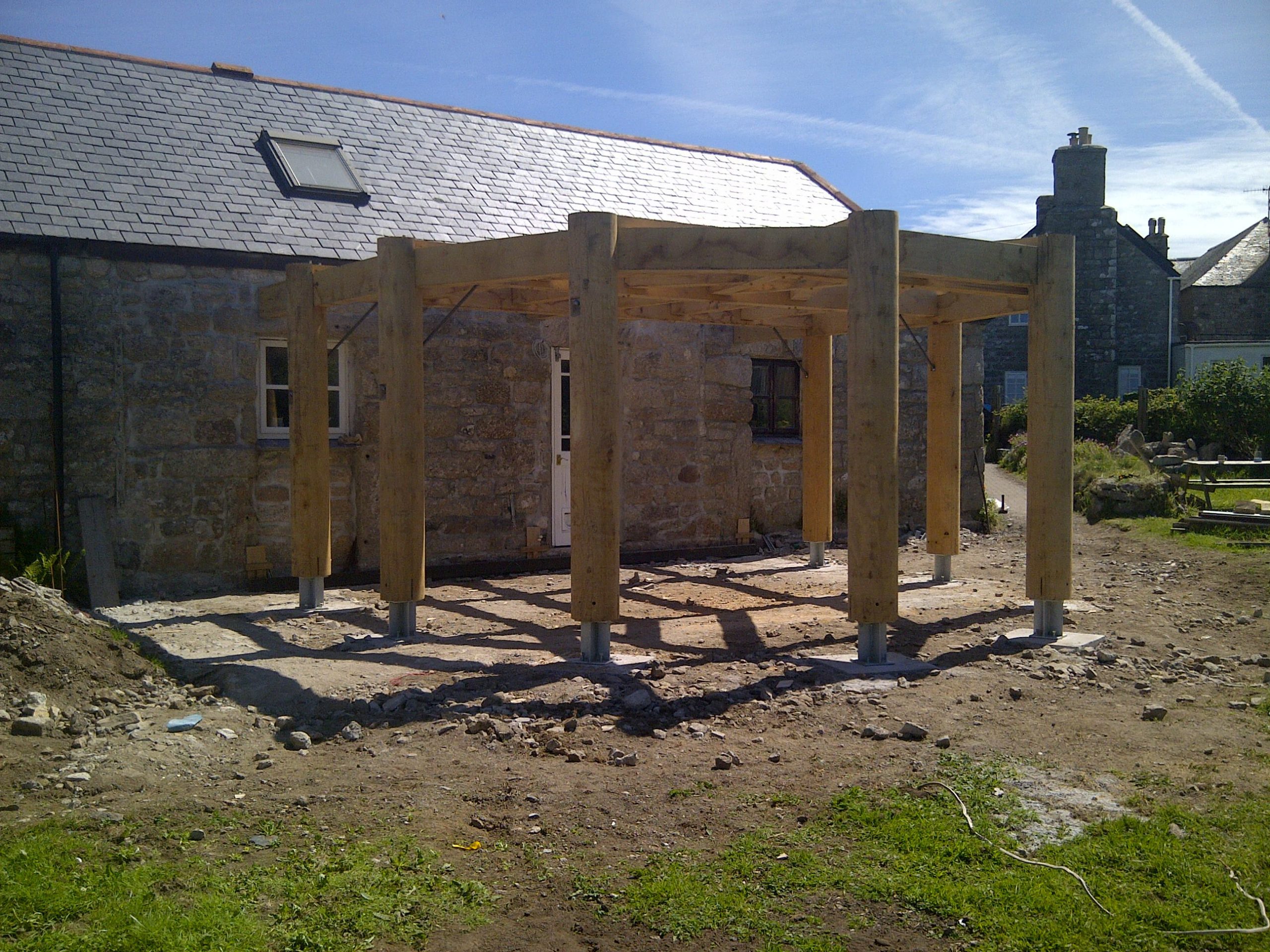a round heavy Oak timber frame garden room being built near St Just in Cornwall