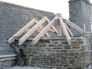 bespoke hand crafted feature roof trusses for curved stairway