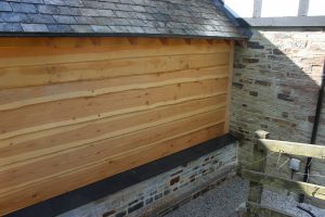 characterful wainey edge douglas fir softwood cladding on a timber framed extension