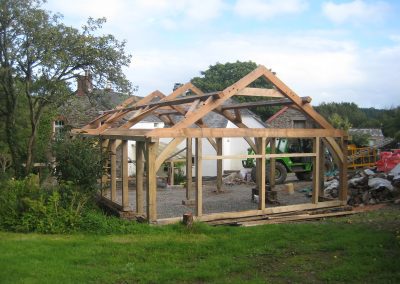 green oak timber framed garage during construction