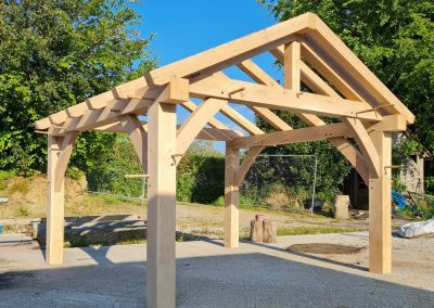 green oak timber frame without roof covering